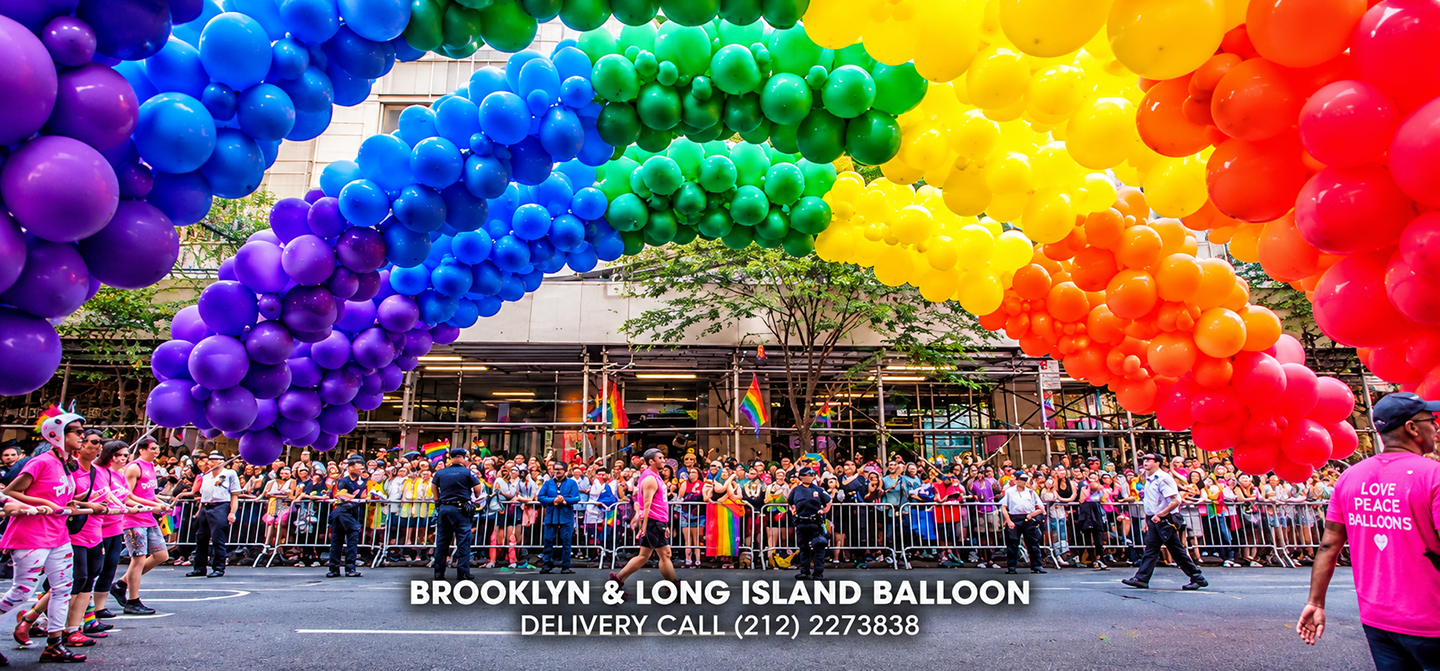 Large rainbow balloon installation over a NYC Pride event by Balloon Saloon